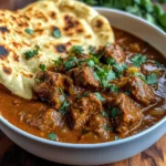 Slow-Cooked Lamb Curry with Garlic Naan